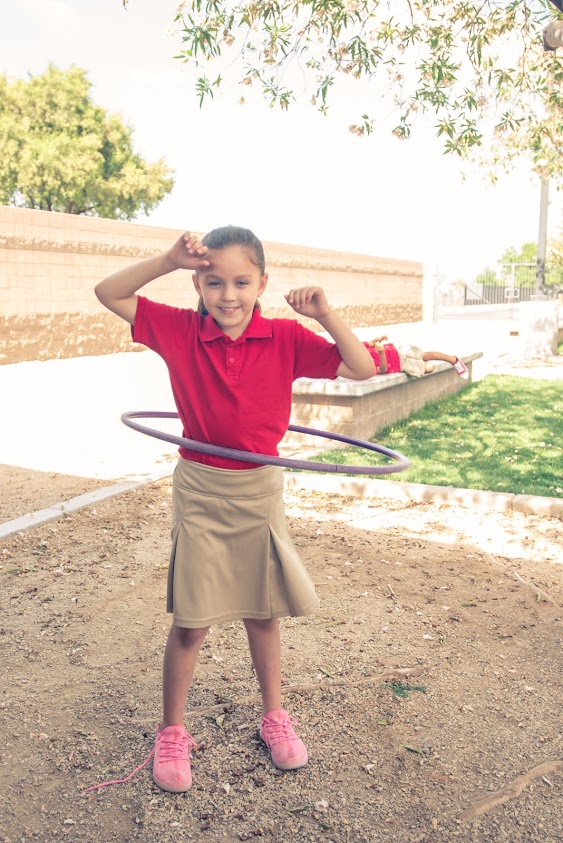 Young Girl with a hula hoop